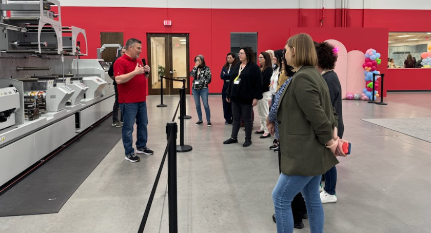 Michael Cox demonstrates Bobst's newest printing equipment.